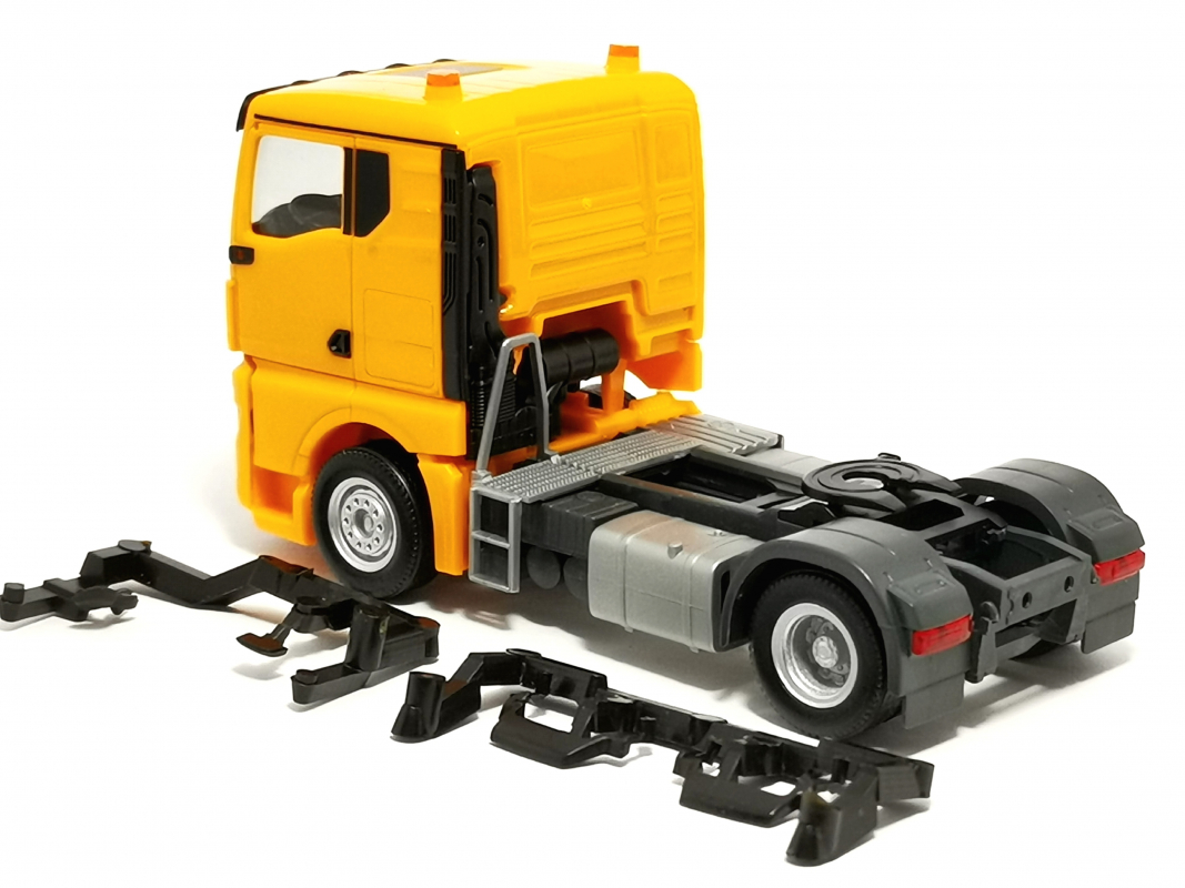 MAN TGX GN 2a Zugmaschine, kommunalorange Herpa