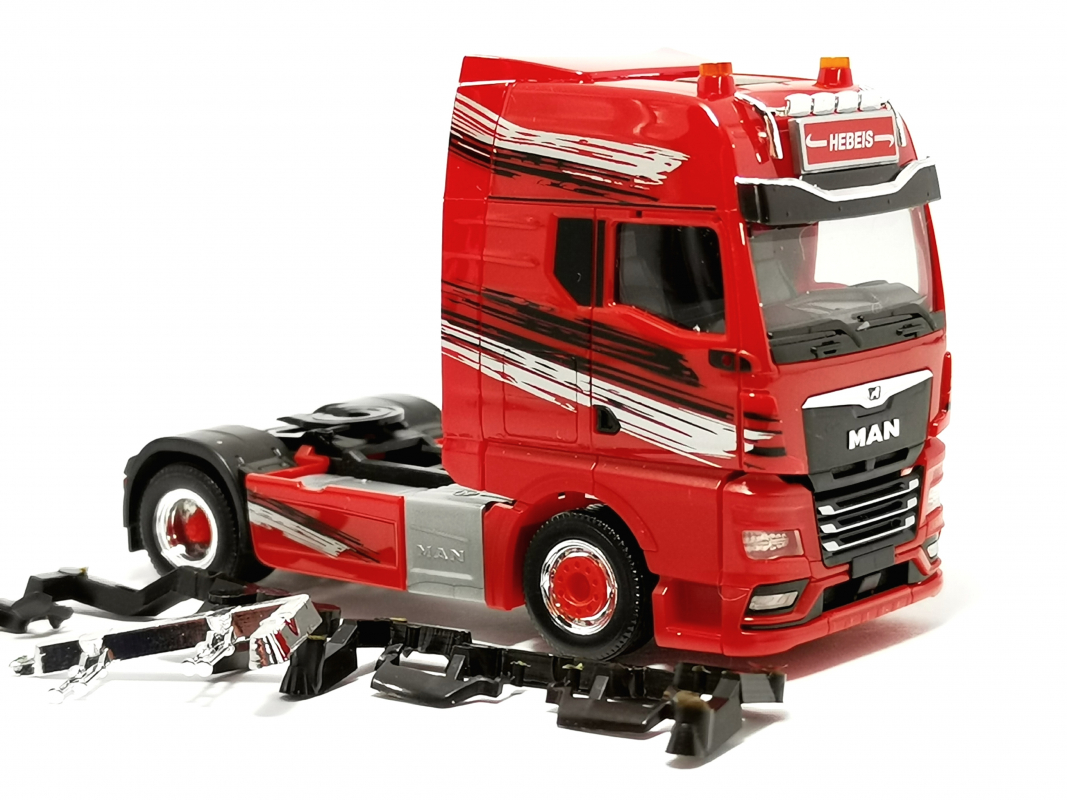 MAN TGX GX Zugmaschine "Hebeis Transporte" Herpa