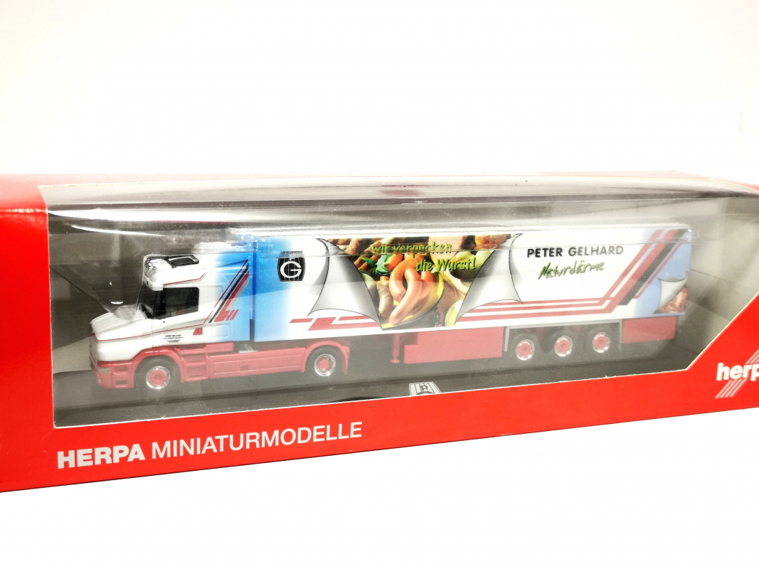 121347 Scania Hauber Kühlkoffer-Sattelzug "Peter Gelhard", PC Herpa