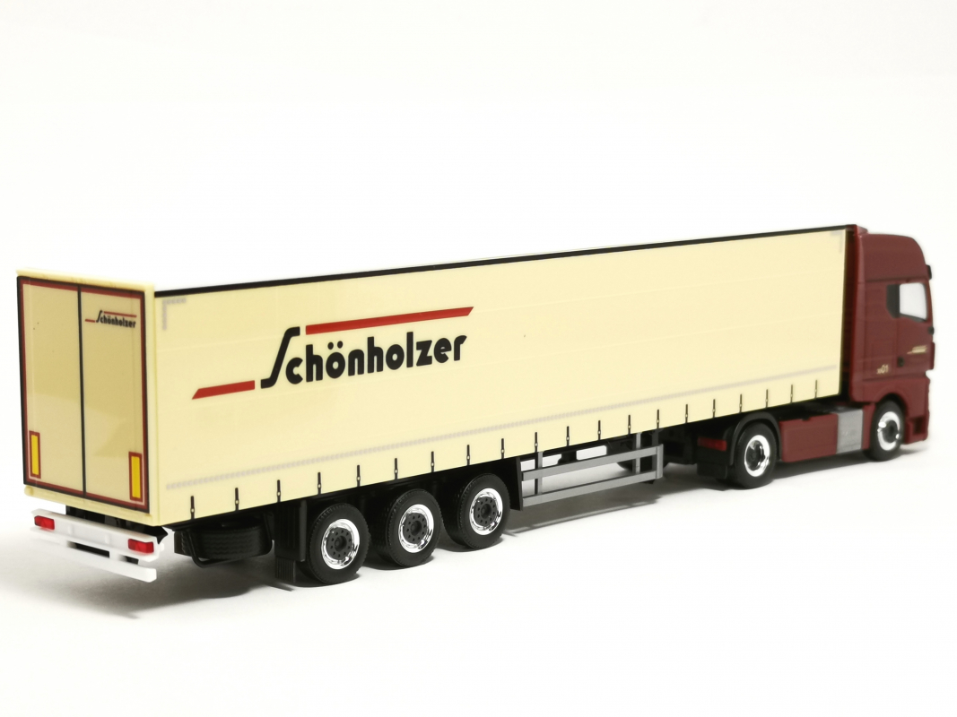 962216 MAN TGX GX Gardinenplanen-Sattelzug "Schönholzer" Herpa