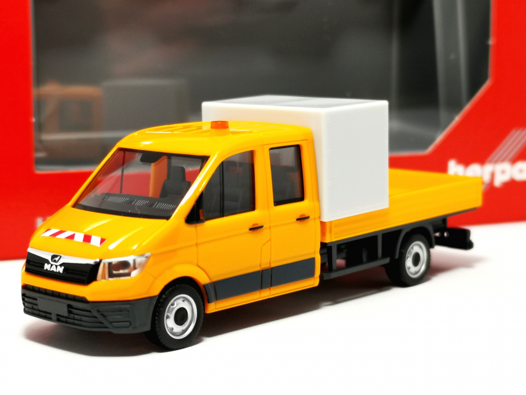 099141 MAN TGE Doppelkabine mit Pritsche, kommunalorange Herpa