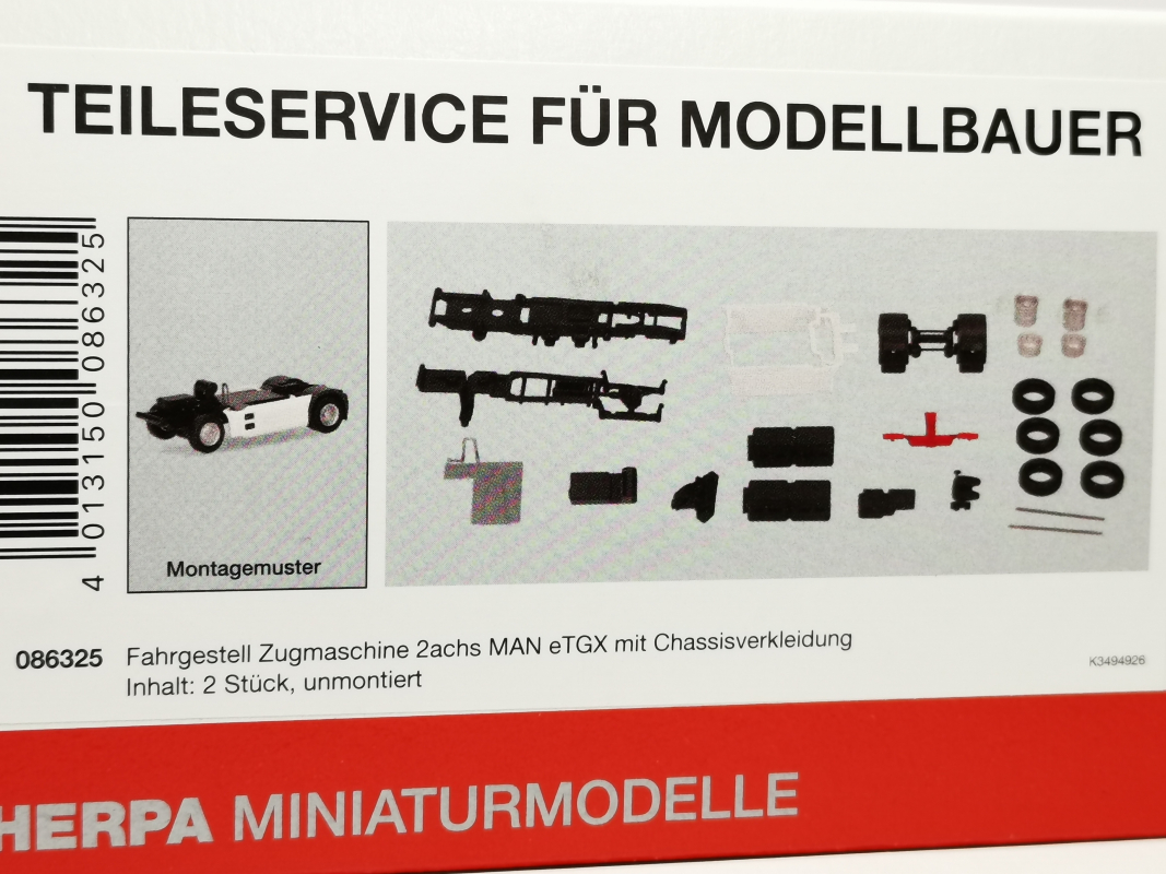 086325 Fahrgestell Zugmaschine 2achs MAN eTGX mit Batteriekästen und Chassisverkl. (2 Stück) Herpa