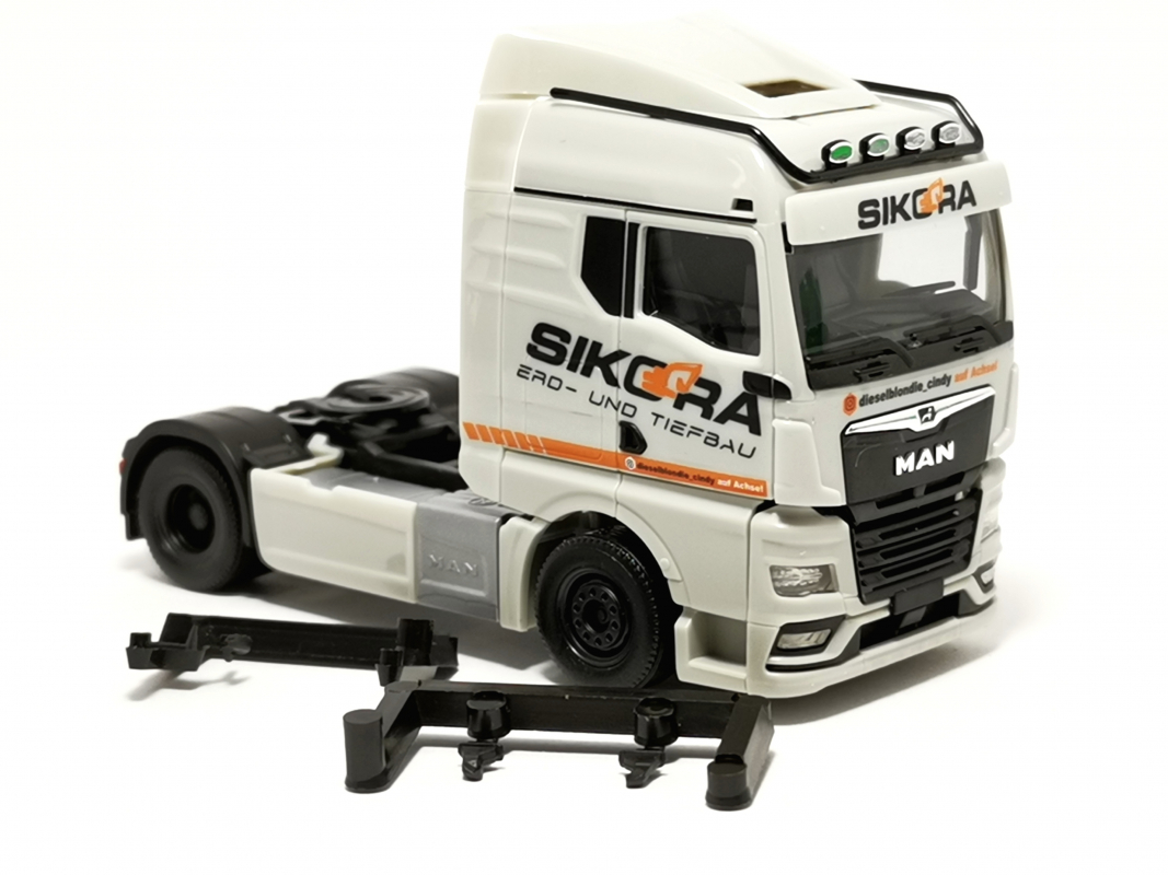 MAN TGX GM Zugmaschine "Sikora/Trucker Babe Cindy" Herpa (NL)