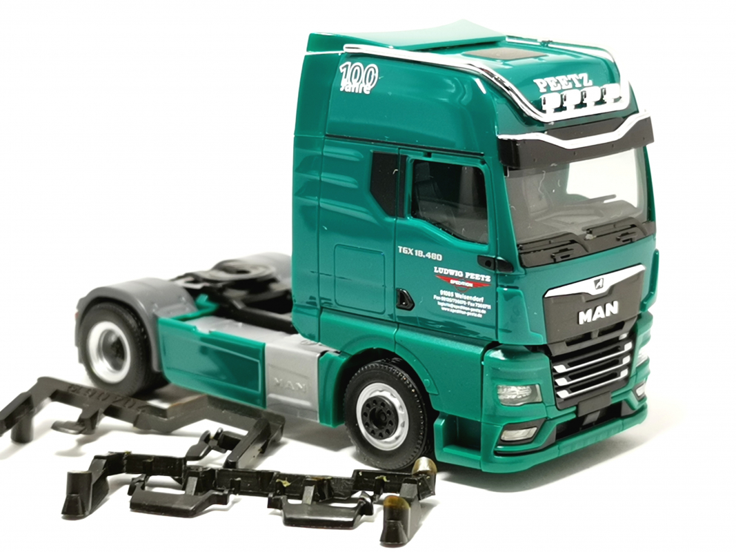 MAN TGX GX Zugmaschine "Spedition Peetz" Herpa