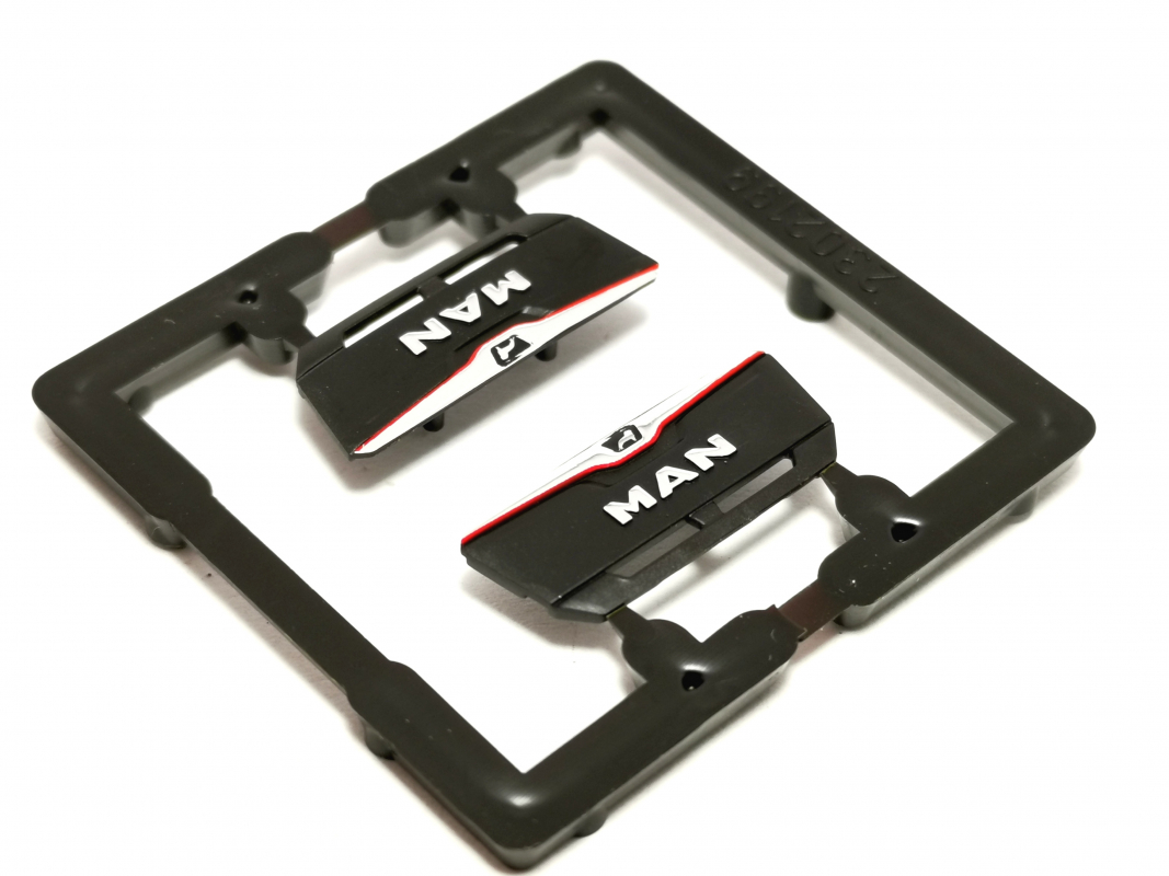 2x Frontgrill MAN TGX GX, schwarz/rot Herpa C668